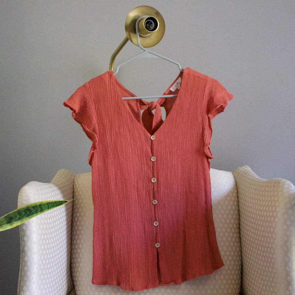 Salmon colored top